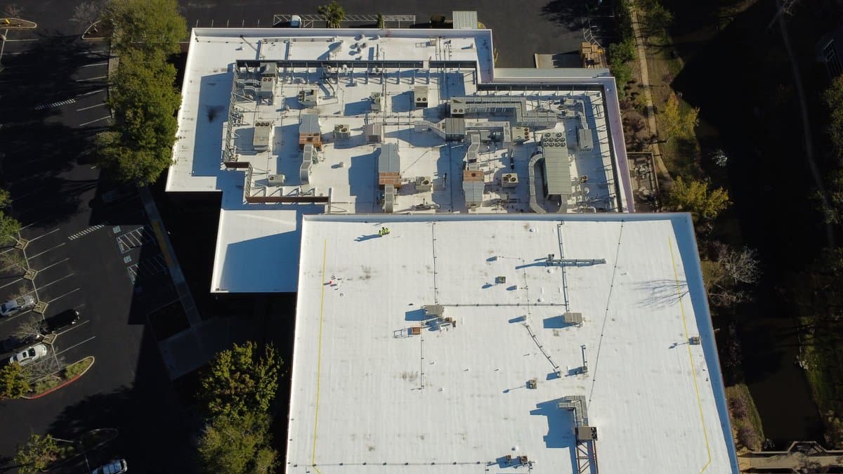 Aerial view of a completed roof restoration system